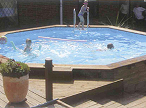 Octagonal Wooden Pool with kids in