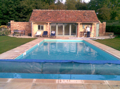 Maintenance on outdoor pool with pool house 2